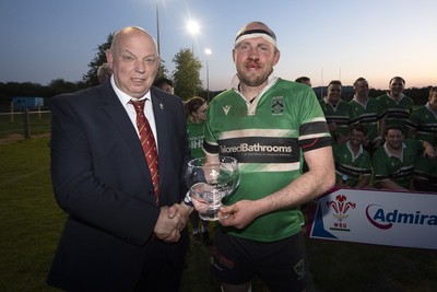 300425 - Gwernyfed RFC League Trophy Presentation - Admiral National League 4 West B - WRU Rep Roy Wilkinson presents the trophy to Gwernyfed RFC Captain Sam Stevens 