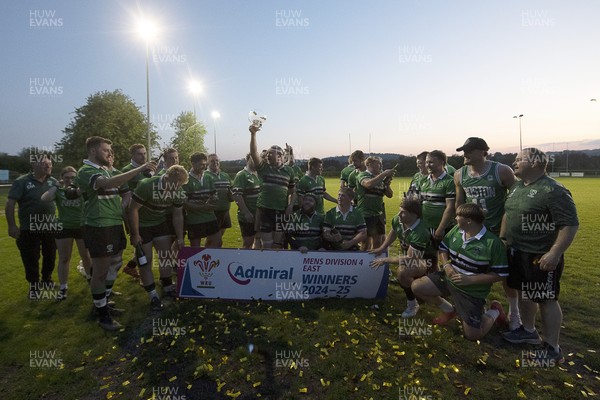 300425 - Gwernyfed RFC League Trophy Presentation - Admiral National League 4 West B - Gwernyfed RFC Captain Sam Stevens celebrates lifting the trophy with his team