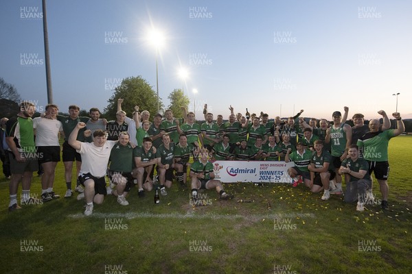 300425 - Gwernyfed RFC League Trophy Presentation - Admiral National League 4 West B - Gwernyfed RFC Captain Sam Stevens celebrates lifting the trophy with his team