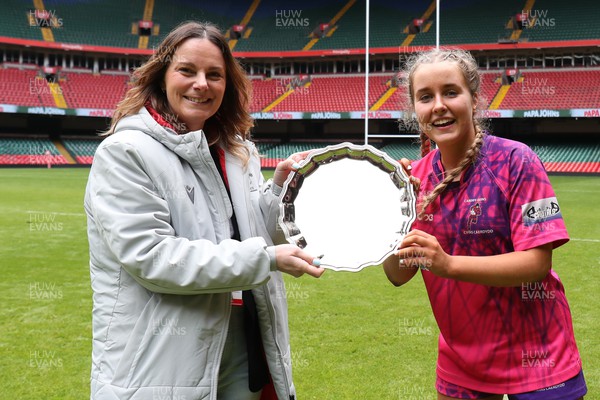 020423 - Gwylliaid Meirionnydd v Cardiff Quins Girls - WRU Girls U16 National Plate Final - Quins captain Grace Daly receives the trophy from Lydia Sterling 