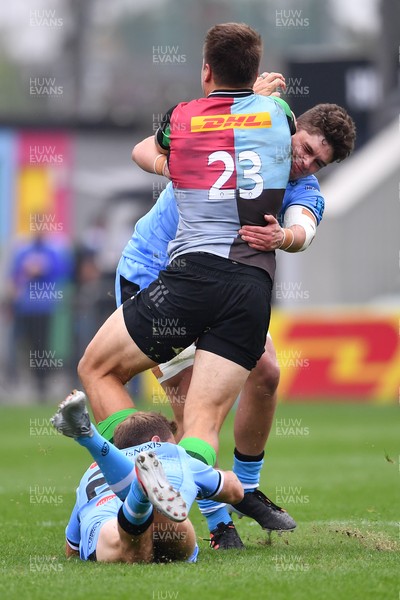 040921 - Harlequins v Cardiff Rugby - Preseason Friendly - Harlequins' Andre Esterhuizen is tackled by Cardiff Rugby's Gwilym Bradley