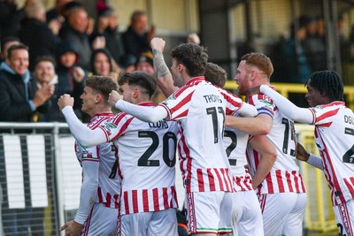 251025 - Harrogate Town v Newport County - Sky Bet League 2 - Newport players celebrate with their fans