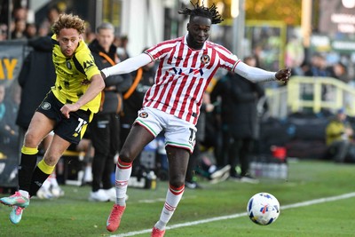 251025 - Harrogate Town v Newport County - Sky Bet League 2 - Stephen Duke-McKenna of Harrogate Town and Cameron Antwi of Newport County 