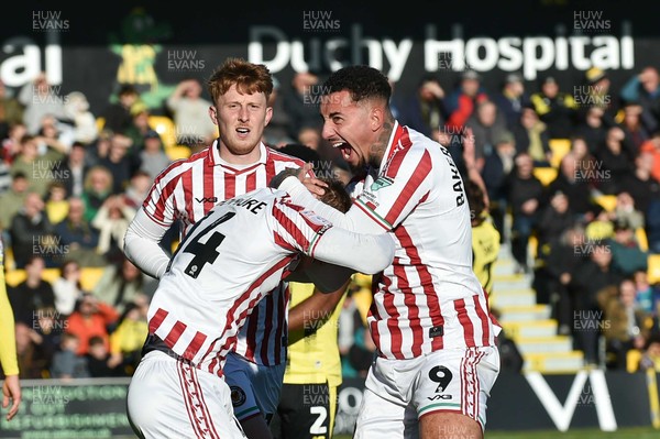 251025 - Harrogate Town v Newport County - Sky Bet League 2 - Courtney Baker-Richardson of Newport County celebrates scoring their first goal with Kai Whitmore of Newport County who provided the assist