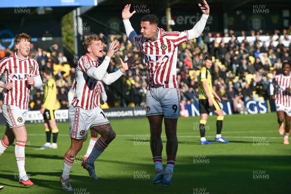 251025 - Harrogate Town v Newport County - Sky Bet League 2 - Courtney Baker-Richardson of Newport County celebrates scoring their first goal with Kai Whitmore of Newport County who provided the assist