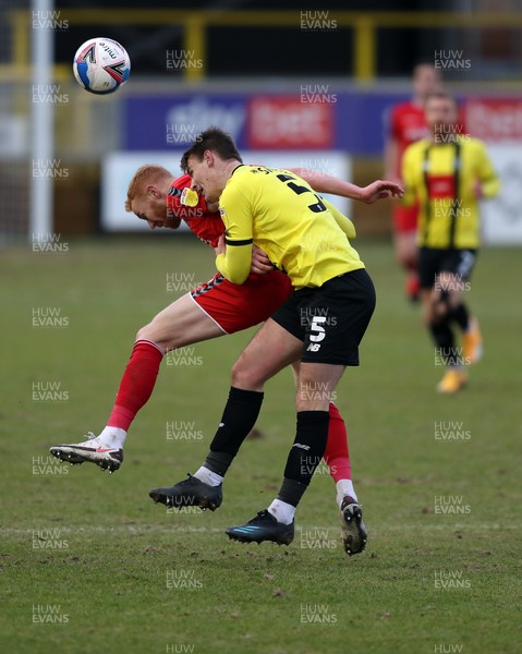 300121 - Harrogate Town v Newport County - Sky Bet League 2 - Will Smith of Harrogate Town and Ryan Taylor of Newport County