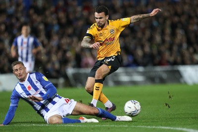 121121 - Hartlepool United v Newport County - EFL SkyBet League 2 - Dom Telford of Newport County has a shot blocked by Hartlepool United's Gary Liddleduring