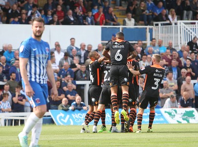 270816 - Hartlepool United vs Newport County - SkyBet League 2 -Sean Rigg is mobbed after his equalising goal