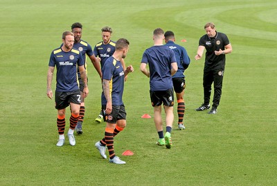 270816 - Hartlepool United vs Newport County - SkyBet League 2 -Asst manager Andy Todd puts the players through their pre match routine as Warren Feeney sits out his touchline ban