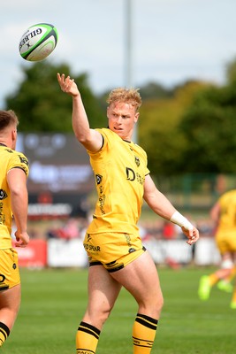 060925 - Hartpury College v Dragons RFC - Preseason Friendly - David Richards of Dragons celebrates scoring a try