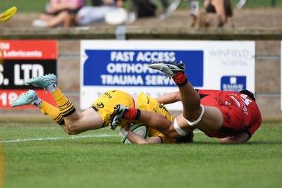 060925 - Hartpury College v Dragons RFC - Preseason Friendly - Niall Armstrong of Dragons scores a try