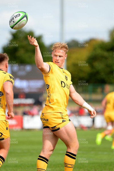 060925 - Hartpury College v Dragons RFC - Preseason Friendly - David Richards of Dragons celebrates scoring a try