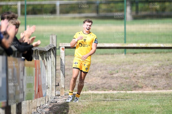 060925 - Hartpury College v Dragons RFC - Preseason Friendly - Rhys Cole of Dragons celebrates scoring a try