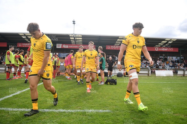 060925 - Hartpury College v Dragons RFC - Preseason Friendly - Dragons players run out at the start of the match