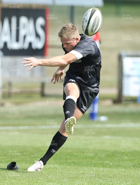 040921 - Hartpury University RFC v Ospreys, Pre-season Friendly - Gareth Anscombe of Ospreys warms up with the match day squad, but does not take part in the match
