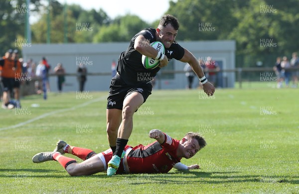040921 - Hartpury University RFC v Ospreys, Pre-season Friendly - Luke Morgan of Ospreys is challenged as he charges for the line