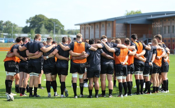 040921 - Hartpury University RFC v Ospreys, Pre-season Friendly - The Ospreys squad huddle together