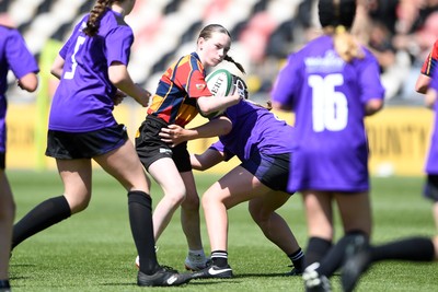 060525 - Haverfordwest High v Ysgol Godrer Berwyn - Girls Schools U12s Cup Final - Efa Celyn of Ysgol Godrer Berwyn is challenged by Rachel Brett of Haverfordwest