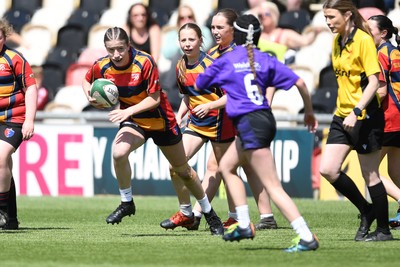 060525 - Haverfordwest High v Ysgol Godrer Berwyn - Girls Schools U12s Cup Final - Fflur Roberts of Ysgol Godrer Berwyn is challenged by Hallie Brick of Haverfordwest