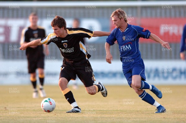 06.08.07 - Haverfordwest County v Cardiff City - Cardiff's Aaron Ramsey holds off the Haverfordwest defence 