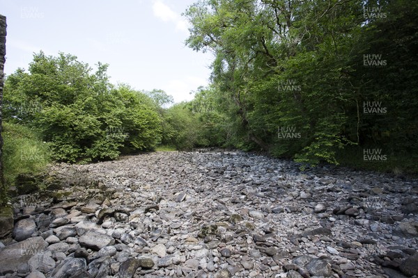 030718 - Picture shows a dried up river bed near Merthyr Tydfil, South Wales during the heatwave which has hit the country
