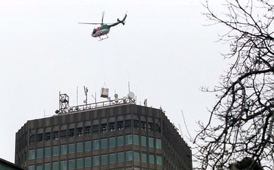 010499 - Helicopter Lift, Cardiff - One of the ventilation units is lifted from Cathays Park to the top of the Capital Tower 