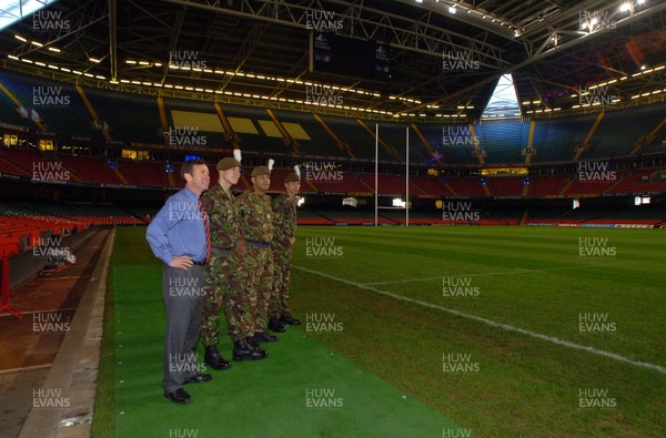 28.11.08 -  WRU - Help for Heroes cheque presentation at the Millennium Stadium  WRU Chief Executive Roger Lewis with Pte.Daryl Johnson, Pte. Ryan Davis and Sgt Anthony Rogers look around the stadium.   