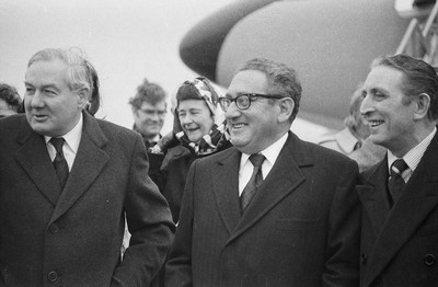 060375 - Dr Henry Kissinger visit to Cardiff for the ceremony to give Jim Callaghan the Freedom of the City  Dr Henry Kissinger is flanked by Foreign Secretary Jim Callaghan(lt) and George Thomas MP at Cardiff Wales Airport