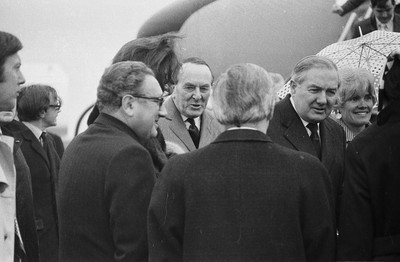 060375 - Dr Henry Kissinger visit to Cardiff for the ceremony to give Jim Callaghan the Freedom of the City  Dr Henry Kissinger (glasses) with Foreign Secretary Jim Callaghan(rt) at Cardiff Wales Airport