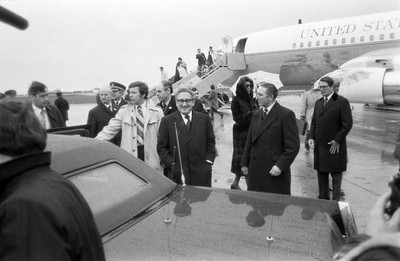 060375 - Dr Henry Kissinger visit to Cardiff for the ceremony to give Jim Callaghan the Freedom of the City  Dr Henry Kissinger (glasses) with George Thomas MP at Cardiff Wales Airport