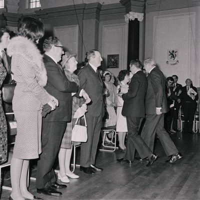 060375 - Dr Henry Kissinger visit to Cardiff for the ceremony to give Jim Callaghan the Freedom of the City  The US Secretary of State, Dr Henry Kissinger and his wife Nancy  watch the ceremony giving the Freedom of the City of Cardiff to Foreign Secretary Jim Callaghan Next to Dr Henry Kissinger are Sir Cenydd Treharne and Lady Treharne The ceremony was in Cardiff City Hall