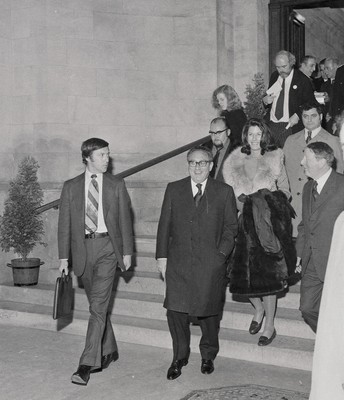 060375 - Dr Henry Kissinger visit to Cardiff for the ceremony to give Jim Callaghan the Freedom of the City  US Secretary of State Dr Henry Kissinger and his wife Nancy leave Cardiff City Hall after the ceremony giving the Freedom of the City of Cardiff to Foreign Secretary Jim Callaghan 