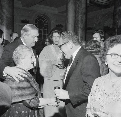 060375 - Dr Henry Kissinger visit to Cardiff for the ceremony to give Jim Callaghan the Freedom of the City  US Secretary of State Dr Henry Kissinger with Foreign Secretary Jim Callaghan meet guests at the banquet in Cardiff City Hall