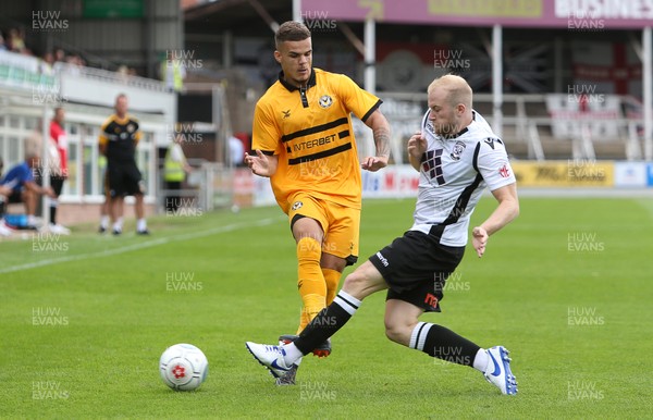 210718 - Hereford FC v Newport County - Pre Season Friendly - Tyler Forbes tackled by Danny Greenslade of Hereford