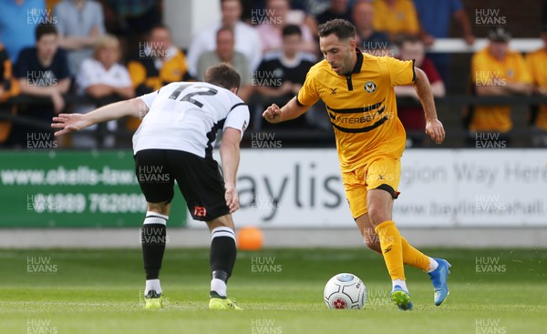 210718 - Hereford FC v Newport County - Pre Season Friendly - Robbie Willmott of Newport County takes on Lewis Hall of Hereford