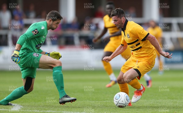 210718 - Hereford FC v Newport County - Pre Season Friendly - Padraig Amond of Newport County beats keeper Martin Horsell of Hereford to score a goal