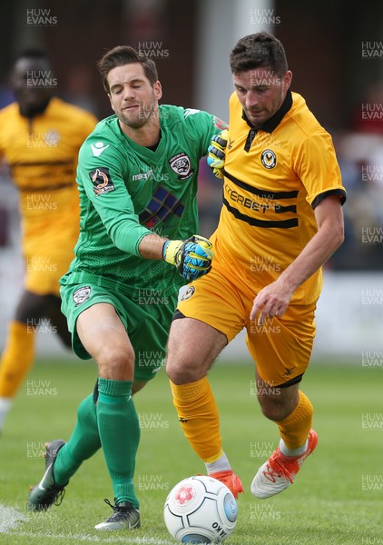 210718 - Hereford FC v Newport County - Pre Season Friendly - Padraig Amond of Newport County beats keeper Martin Horsell of Hereford to score a goal