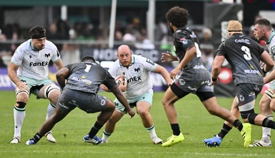 260926 - Hollywoodbets Sharks v Ospreys - United Rugby Championship - Rhys Henry of Ospreys is challenged by Phatu Ganyane of The Sharks