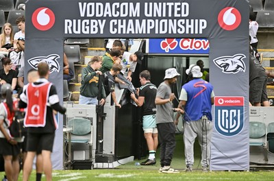 260926 - Hollywoodbets Sharks v Ospreys - United Rugby Championship - Ospreys player signing autographs for the local fans