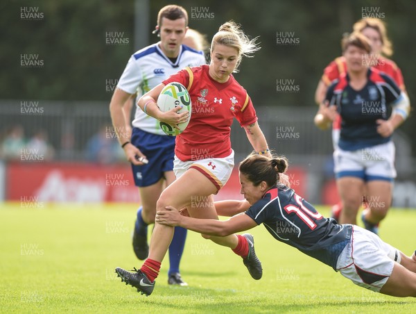 Hong Kong v Wales - 2017 Women's Rugby World Cup Pool A - Keira Bevan of Wales is tackled by Rose Hopewell-Fong of Hong Kong