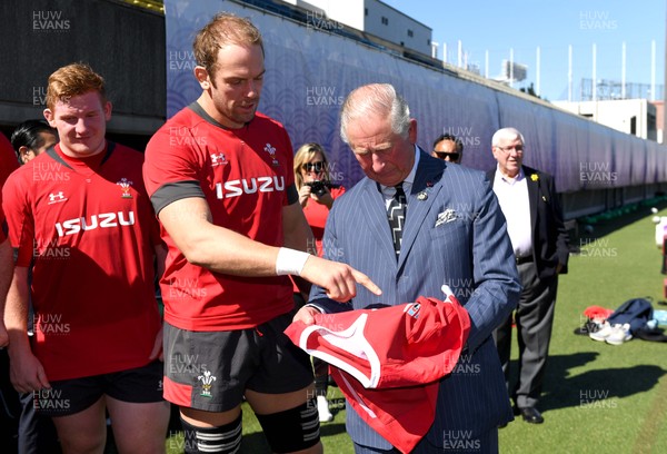 231019 - Wales Rugby Training - HRH Prince of Wales is presented with a signed jersey by Alun Wyn Jones during Wales training