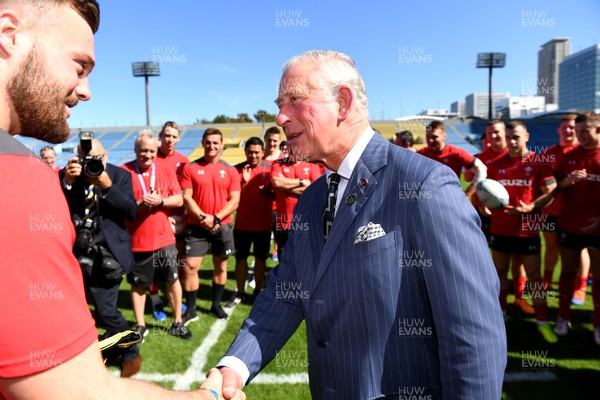 231019 - Wales Rugby Training - HRH Prince of Wales presents Owen Lane with his Rugby World Cup cap during Wales training