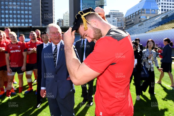 231019 - Wales Rugby Training - HRH Prince of Wales presents Owen Lane with his Rugby World Cup cap during Wales training
