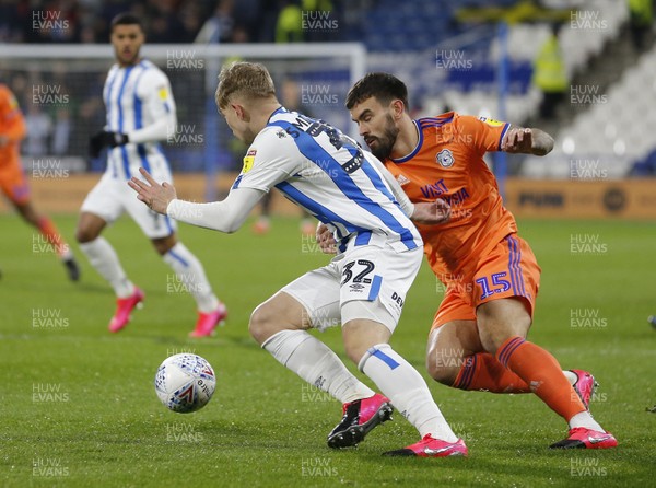 120220 - Huddersfield Town v Cardiff City - Sky Bet Championship - Marlon Pack of Cardiff tackles Emile Smith Rowe of Huddersfield 
