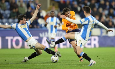 140426 - Huddersfield Town v Cardiff City - Sky Bet League 1 - Ollie Tanner of Cardiff and Sean Roughen of Huddersfield and Cameron Humphreys of Huddersfield