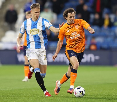 140426 - Huddersfield Town v Cardiff City - Sky Bet League 1 - Ryan Wintle of Cardiff and Bojan Radulovic of Huddersfield