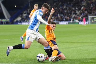 140426 - Huddersfield Town v Cardiff City - Sky Bet League 1 - Alex Robertson of Cardiff and Cameron Humphreys of Huddersfield