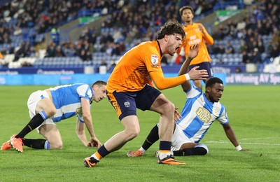 140426 - Huddersfield Town v Cardiff City - Sky Bet League 1 - Ollie Tanner of Cardiff Shoots for goal past Bali Mumba of Huddersfield and Murray Wallace of Huddersfield but sees it past the goal
