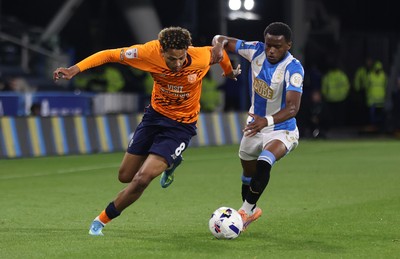 140426 - Huddersfield Town v Cardiff City - Sky Bet League 1 - Omari Kellyman of Cardiff and Bali Mumba of Huddersfield