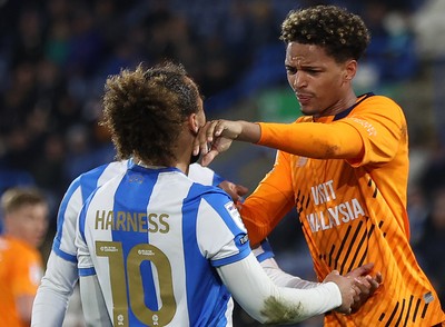 140426 - Huddersfield Town v Cardiff City - Sky Bet League 1 - Omari Kellyman of Cardiff and Marcus Harness of Huddersfield tussle